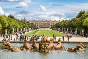 Fountain of Apollo in garden of Versailles Palace in a beautful summer day in France.